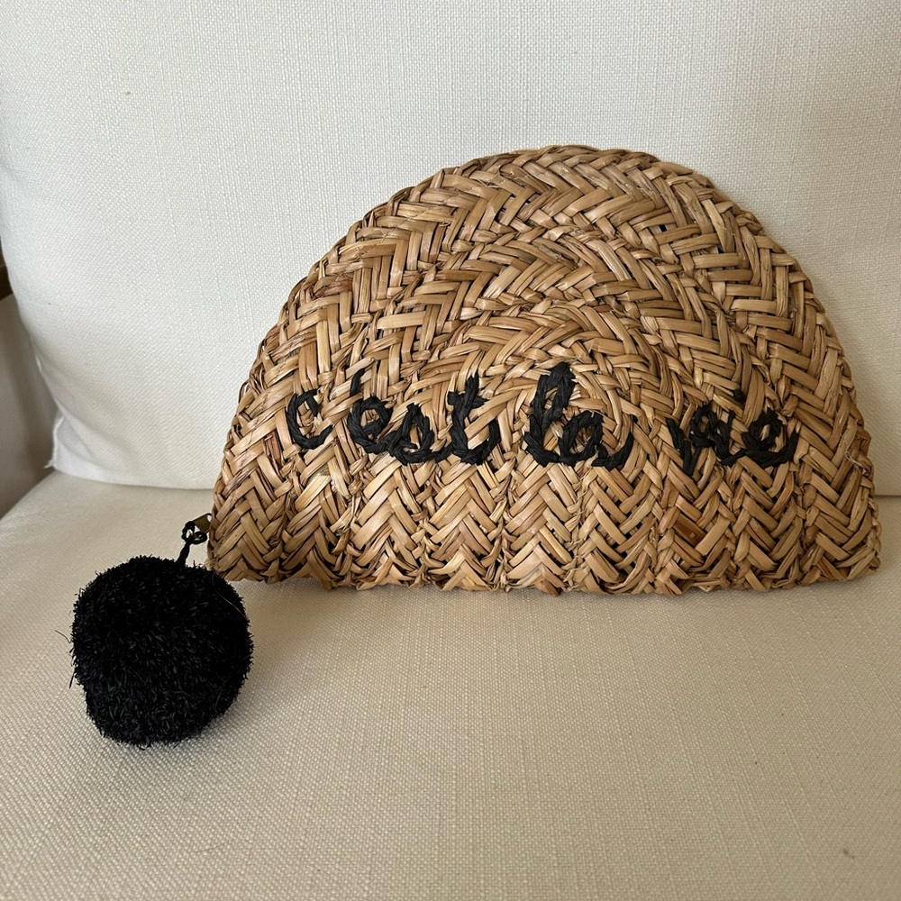 MUDPIE “C’est La vie” Woven Straw Clutch with Black Pom Pom